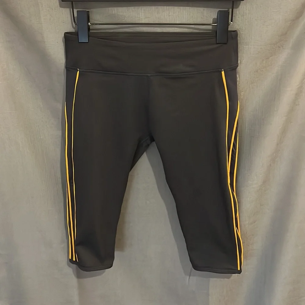 Fabletics Black Capri Leggings with Orange Piping